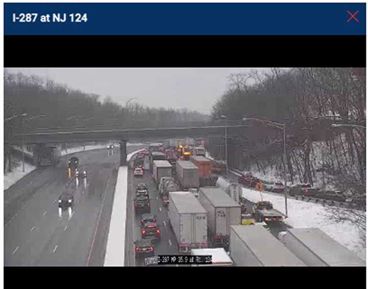 A truck jackknifed on Route 287.