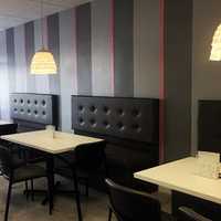 <p>Pink Petal Cakes also offers booth seating in matching decor.</p>