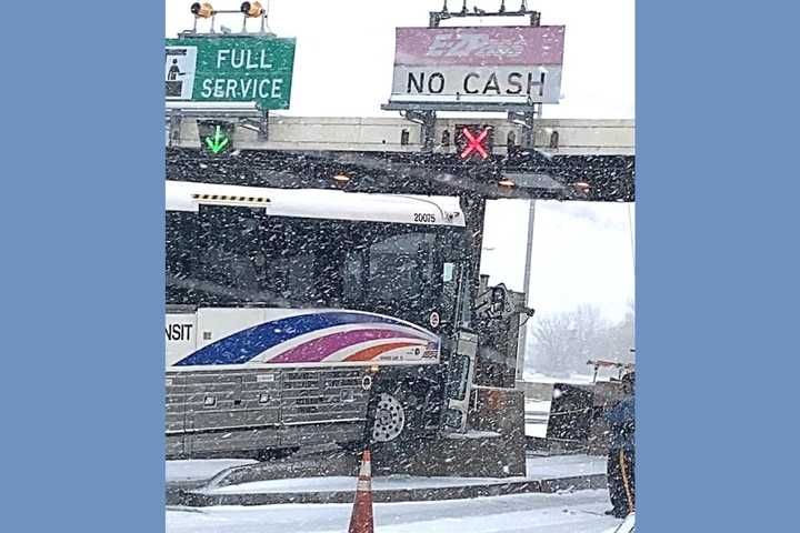 WEATHER WHOAS: Bus Slams Into NJ Turnpike Toll Plaza