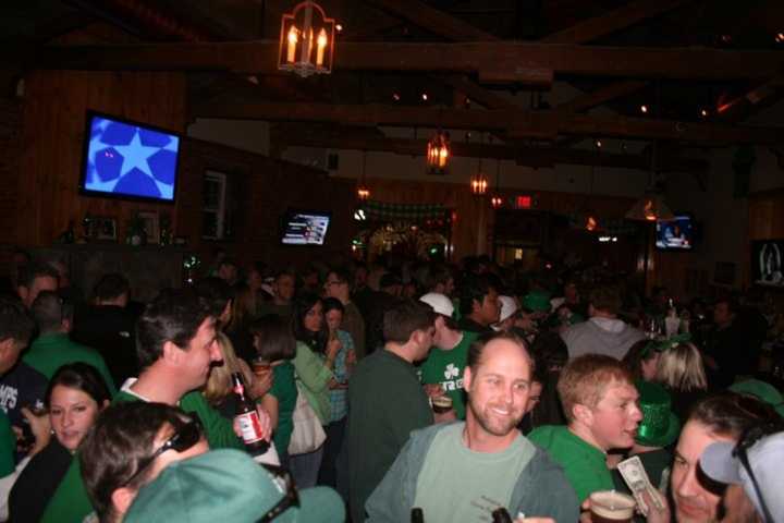 Patrons enjoy Brennan’s Shebeen in Black Rock, which will be part of the Barnum Pub Fest on Saturday, June 4.