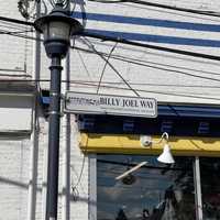 <p>A street sign for the new Billy Joel Way in Oyster Bay.</p>