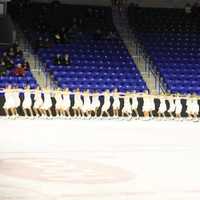 <p>Girls from Stamford compete on a Skyliners synchronized skating line.</p>