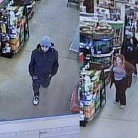 <p>Surveillance photos released by Westford police show the suspects in action.</p>