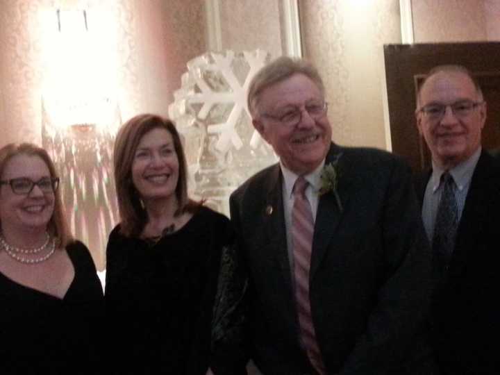 Award recipient Dr. Roger Fazzone, second from right, takes a moment to pose with friends of The Arc of Dutchess.