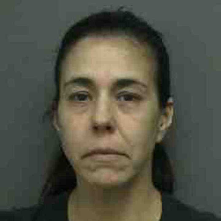 Michelle Squillante was charged with stealing a business check from her ex-husband and cashing it for more than $2,000.