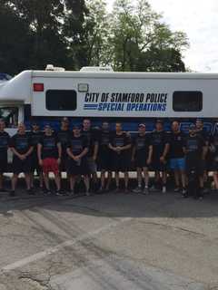 Stamford Police Officers Carry The Torch For Special Olympics