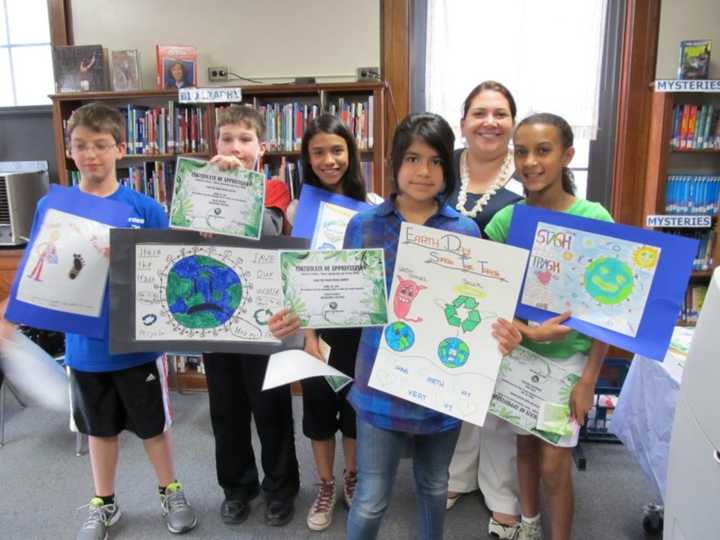 Kids honor the planet at a past Earth Day celebration in Ossining.