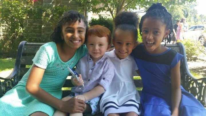 Gabby Cappello, left; and her sisters Regan, right, and Riley, second from right, with their cousin Chase Stellwagen, will start school in the Rye Neck district on Tuesday.