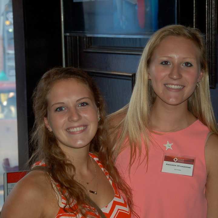 Two attendees enjoy a prior year&#x27;s SoNo Stroll, an annual fundraising event held by the Norwalk-based Human Services Council.