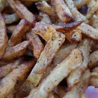 <p>The salt-and-pepper fries at Super Duper Weenie in Fairfield are so flavorful, you might not need ketchup.</p>