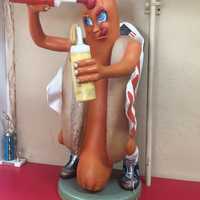 <p>Super Duper Weenie&#x27;s hot dogs (and french fries) are apparently so good that this fiberglass version looks ready to take a bite out of himself.</p>