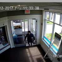 <p>Surveillance footage of the woman accused of robbing the First County Bank on Connecticut Avenue in Norwalk.</p>