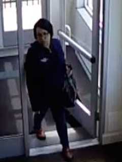 Norwalk Police Release Photos Of Woman Who Robbed Bank In Walmart Vest