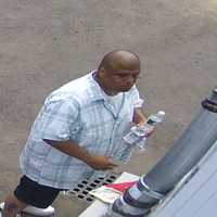 <p>Norwalk Police are searching for the man pictured in connection with a stolen vehicle.</p>