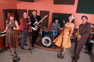 Eight to the Bar to Play Trumbull Library