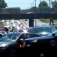 <p>Route 208 was a noontime mess after power lines fell across the highway in Glen Rock on Saturday, July 30.</p>