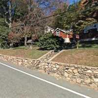 West Milford PD: Drunk Driver Keeps Going On Flat Tire, Bashed Front End, After Rock Wall Crash