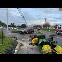 John Deere Tractor Rear-Ended By Sedan On Highway
