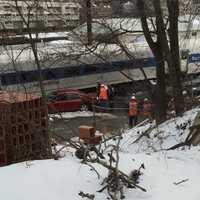 <p>A Danbury-bound train slammed into a car on the tracks at a private grade crossing in Central Norwalk on Tuesday afternoon.</p>