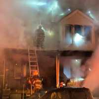 <p>A fire on Trinity Street in Philadelphia sent two kids to the hospital early Wednesday. Fire officials suspect arson.</p>