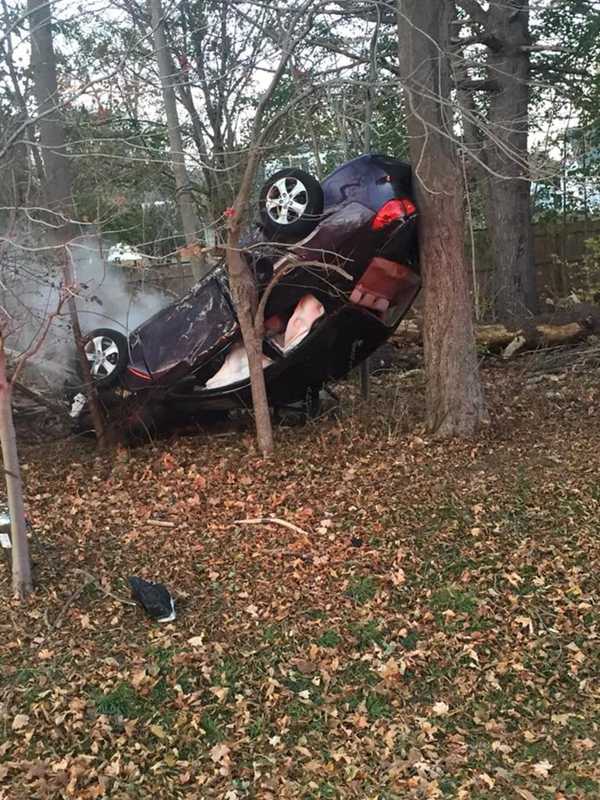 Car Flips Over, Engine Catches Fire After Trumbull Crash