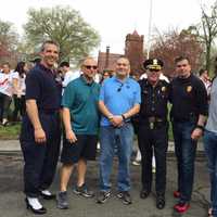 <p>Trumbull Chief Michael Lombardo and area police chiefs participated in the Walk a Mile in Her Shoes event in Fairfield Saturday morning.</p>