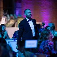 <p>Hector got recognized at a Make-A-Wish gala for fundraising by running the marathon.</p>