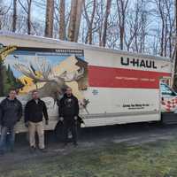 <p>One container, shipped through a Polish shipping agency, can accommodate up to three filled U-Haul trucks, like the one shown here.</p>