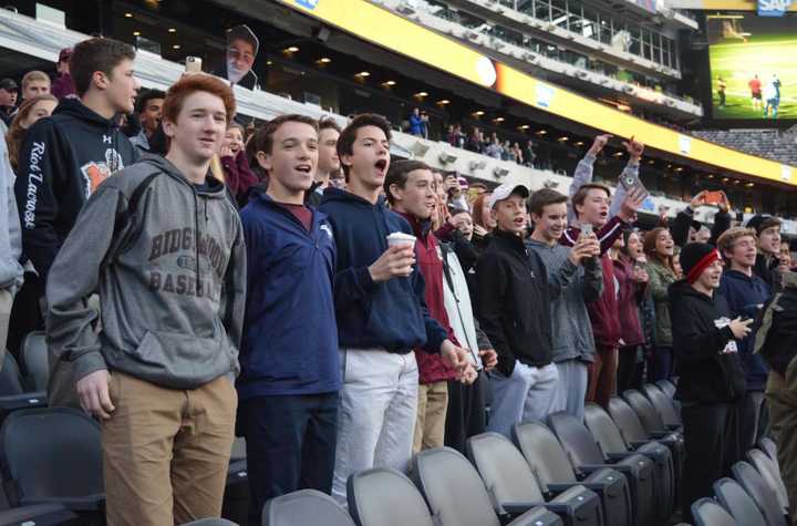 Ridgewood fans cheer on the football team during the state finals game against Passaic Tech at MetLife Stadium last year.