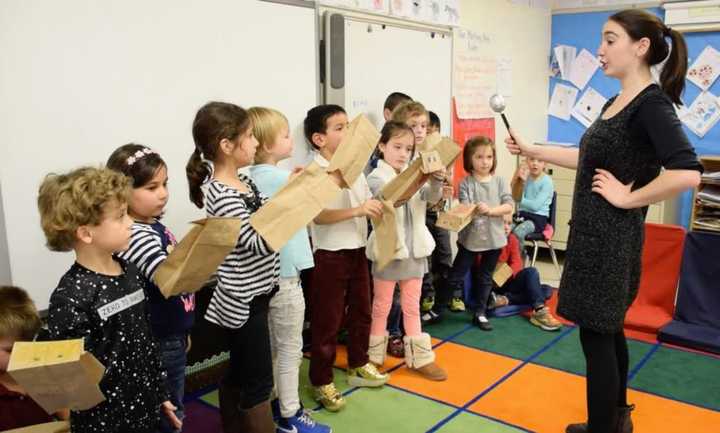 Bronxville Elementary School students worked with Rachel Berger, programs director for the Play Group Theatre, to act out emotions and plots from different folktales and fables.