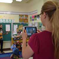 <p>Bronxville Elementary first-grade students act out an Australian folktale while their teacher films them, as part of training on iMovie through the Jacob Burns Film Center.</p>