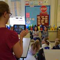 <p>Bronxville Elementary first-grade students act out an Australian folktale while their teacher films them, as part of training on iMovie through the Jacob Burns Film Center.</p>