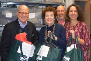 White Plains Club Donates $10,000 To Help Clothe Kids