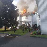 <p>Danbury firefighters battled a four-unit condo blaze.</p>