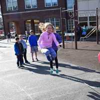 <p>Bronxville Elementary School fifth-graders work paired with younger students for the program.</p>