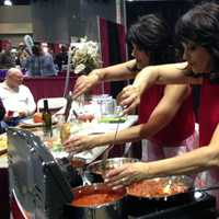 <p>Joy Paoletti of Trumbull and Judy Vig of Monroe show off their cooking skills - and sisterly banter -- on a new HooplaHa series.</p>