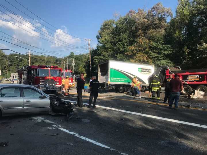 Route 303 is closed in both directions following a three-car crash.