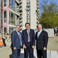 <p>Yonkers Mayor Mike Spano with developers from Ginsberg Development Companies outside of the River of Tides at Greystone at the topping off ceremony.</p>