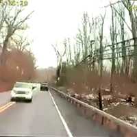 <p>A camera on a bus that was hit by an SUV shows the vehicle crossing the double yellow line.</p>