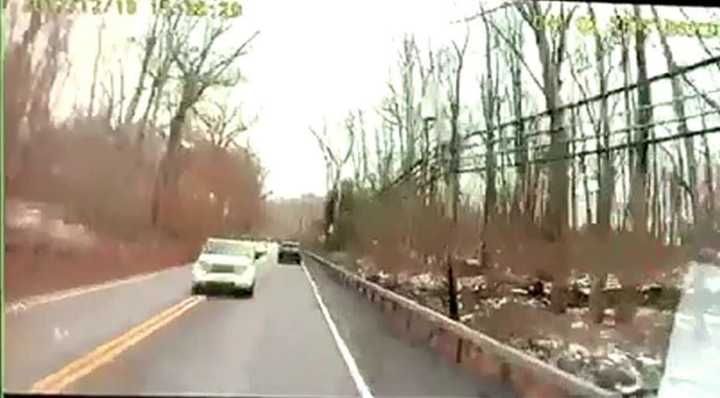 A camera on a bus that was hit by an SUV shows the vehicle crossing the double yellow line.