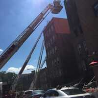 <p>Yonkers firefighters were joined by four other departments as they battled a four-alarm blaze.</p>