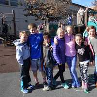 <p>Bronxville Elementary School fifth-graders work with younger students as part of the school’s Lunch Buddy program.</p>