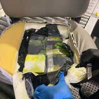 <p>The 13 cocaine bricks weighed a combined 13.7 kilograms, or 30 pounds and three ounces. The cocaine has an estimated street value of nearly $1 million.</p>