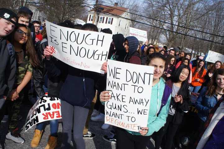 Carmel High School students take part in national walkout against gun violence.