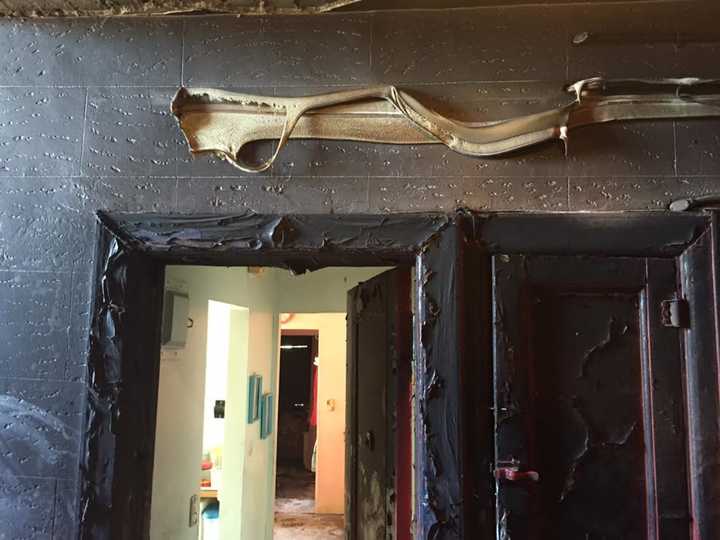 An early morning Yonkers apartment building fire was caused by a resident falling asleep with a cigarette.