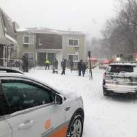 <p>Emergency responders check out a building collapse.</p>