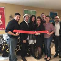 <p>Cynthia Soto with family and friends at the grand opening of her restaurant in West Milford.</p>