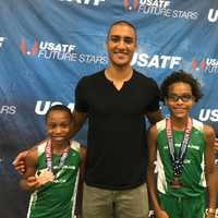 <p>Mamaroneck&#x27;s Jaden and Kyle Snow with Ashton Eaton.</p>