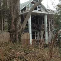 <p>The home at 30 West Rocks Road was heavily damaged in the fire.</p>