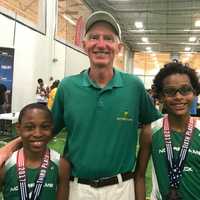<p>Jaden and Kyle Snow with the coach and founder Joe McMahon of Notre Dame TC in Yonkers.</p>